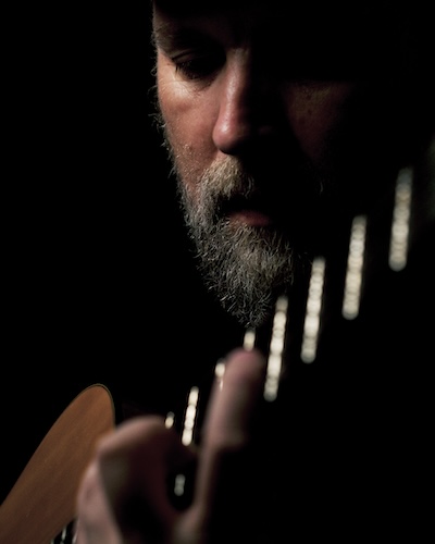 DJHeadshot26 Headshot of Darren Jones with Guitar